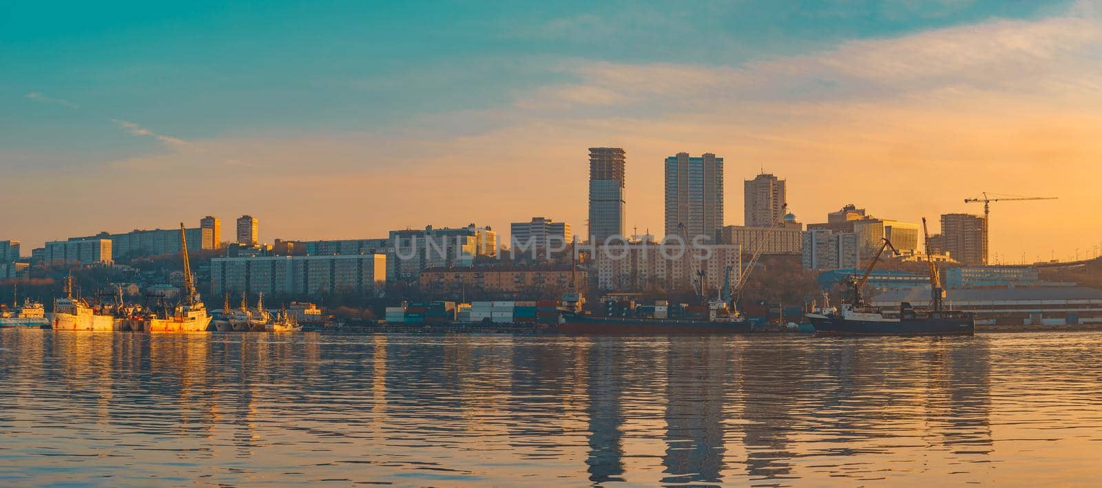 Vladivostok, Russia-January 29, 2019: Panorama of the urban landscape with buildings on the background of the sea and coastline.