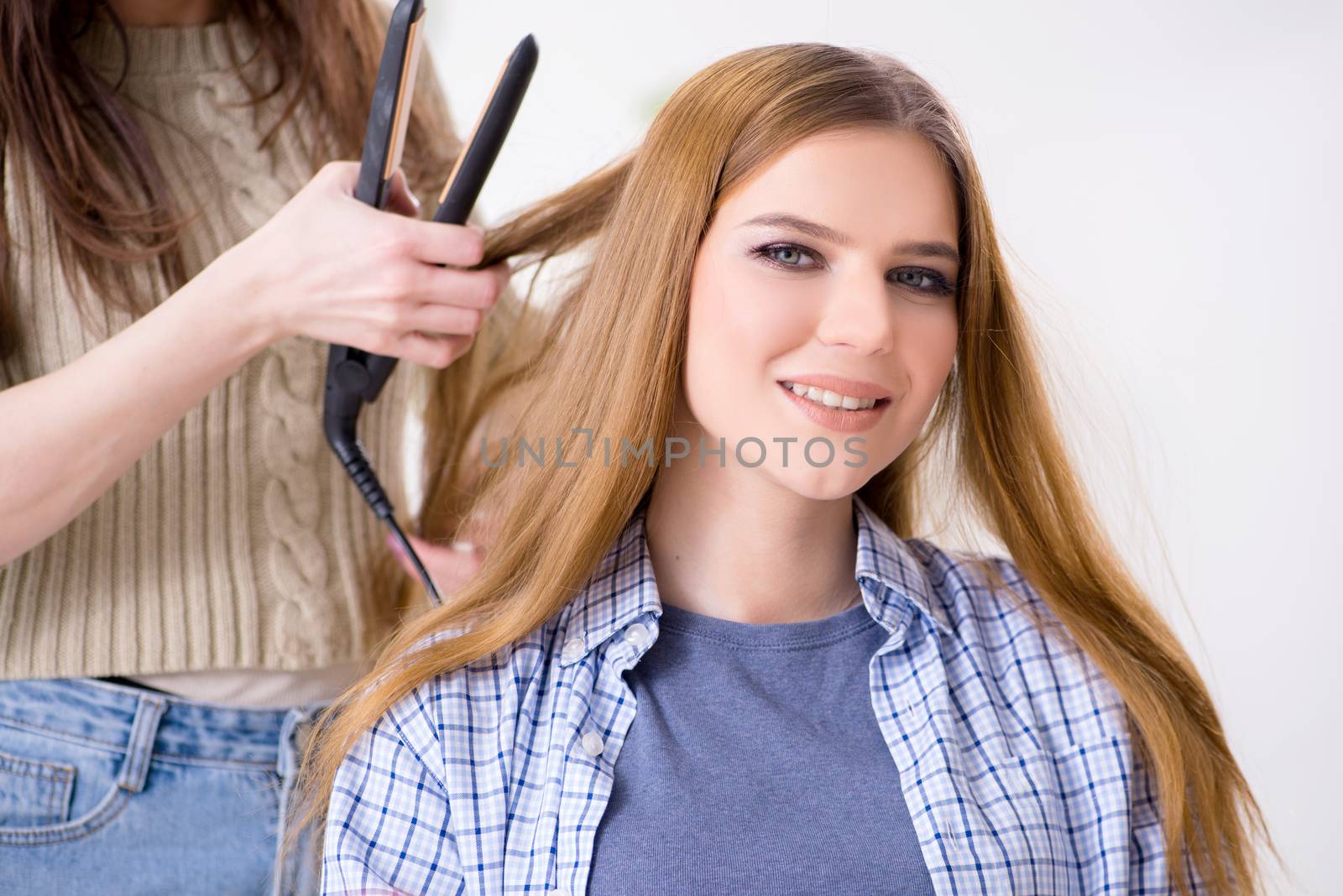 Woman getting her hair done in the beauty salon