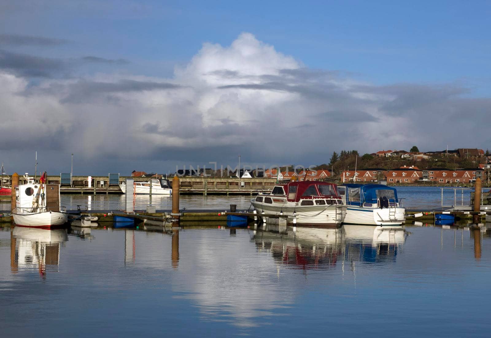Small sea fishing boats anchored at harbor in Lemvig, Denmark