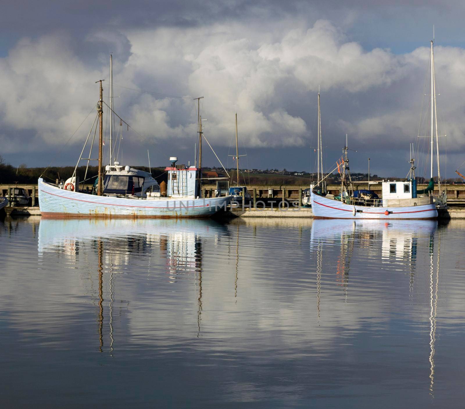 Sail boats anchored at the bay by Lirch