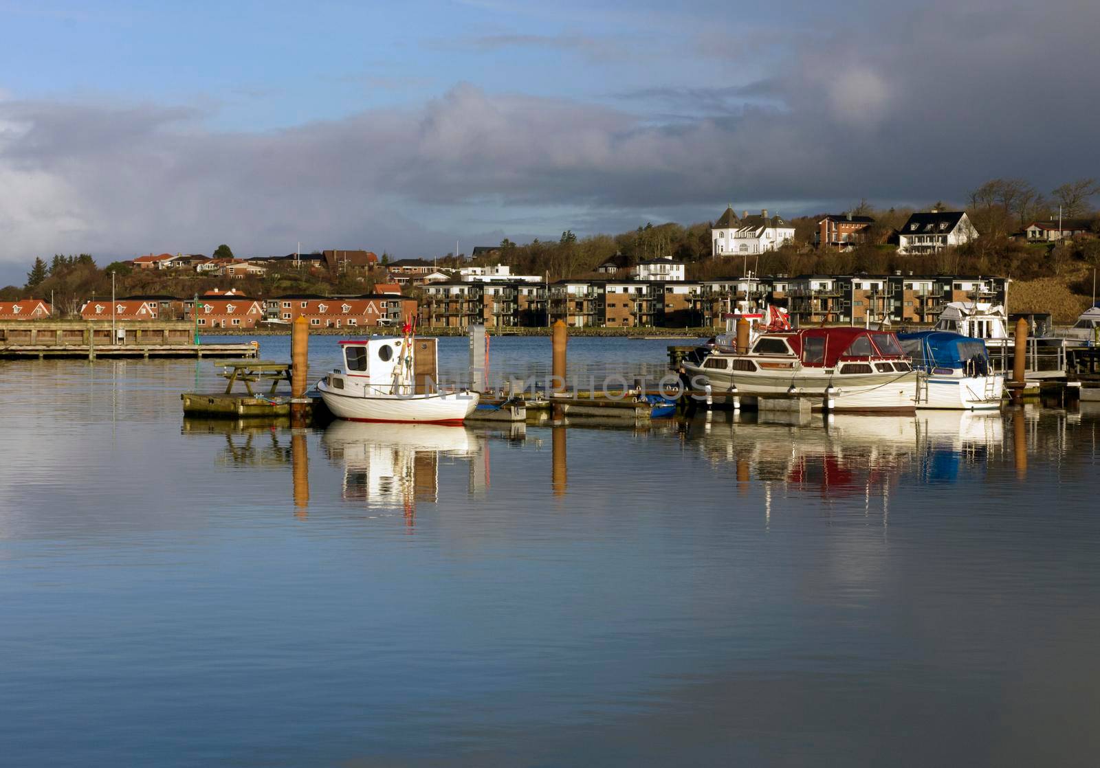 Small sea fishing boats anchored at harbor in Lemvig, Denmark