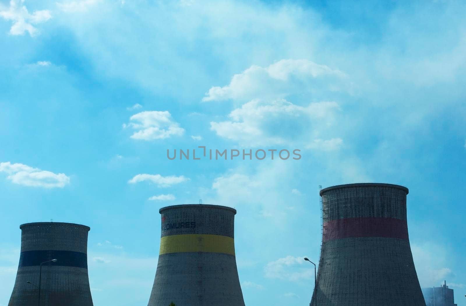 Poluting chimneys of the chemical plant of Targu Mures, Romania. 21 August 2019