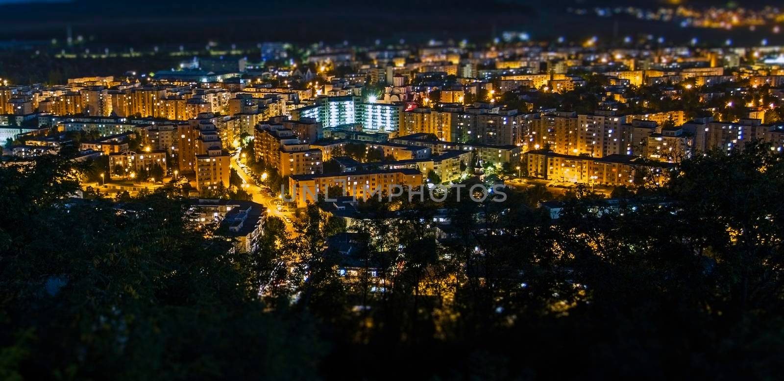 Targu Mures city night time background seen from a high place