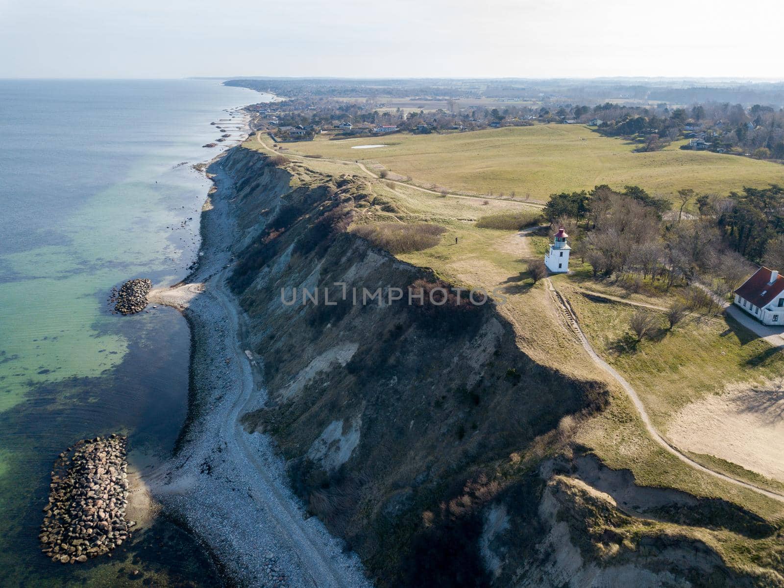 Drone View of Spodsbjerg Lighthouse and Coastline by oliverfoerstner