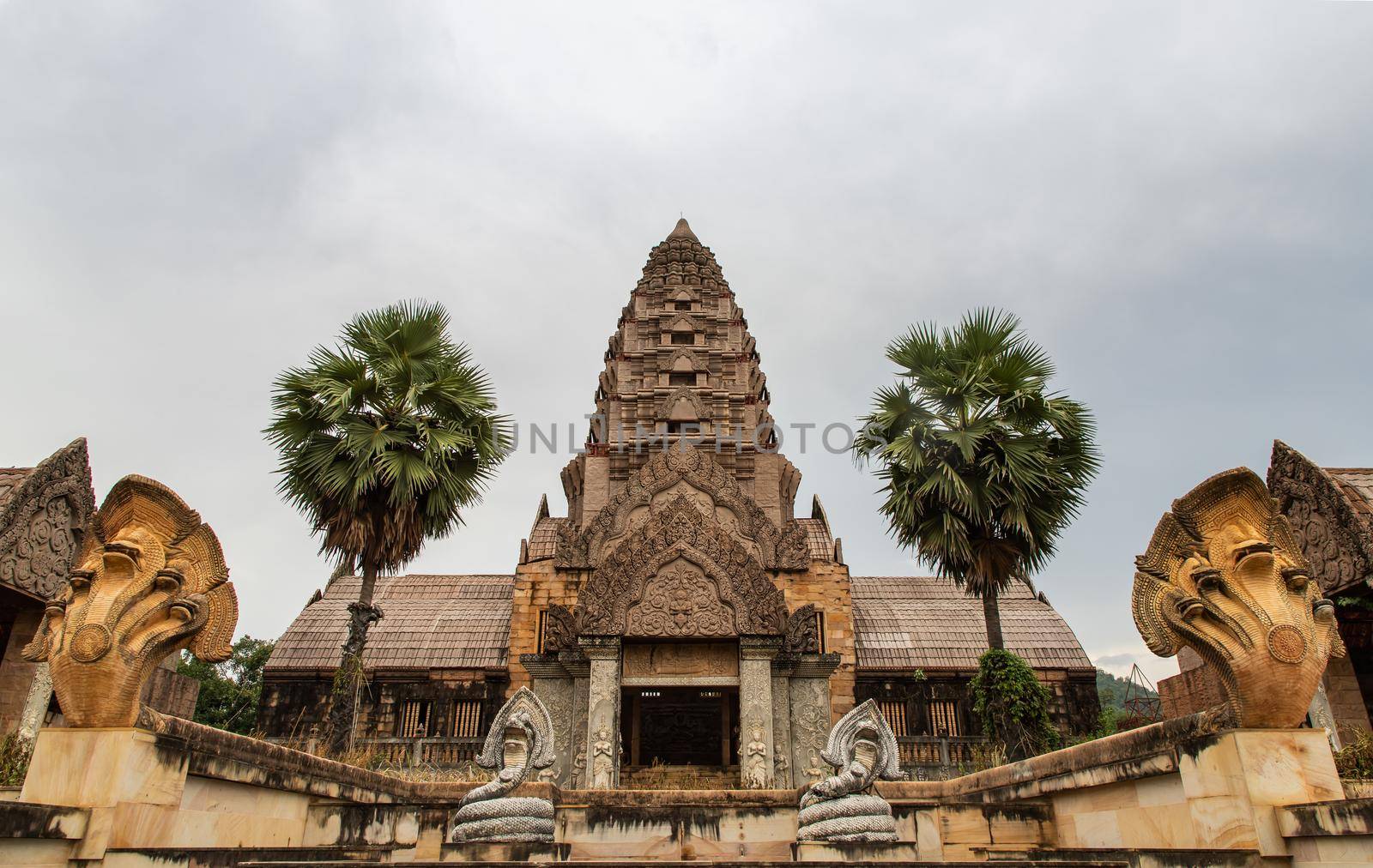 Facade of Old ruined abandoned Mansion view. A historic mansion inspired by the Cambodian of Angkor Wat. Selective focus.
