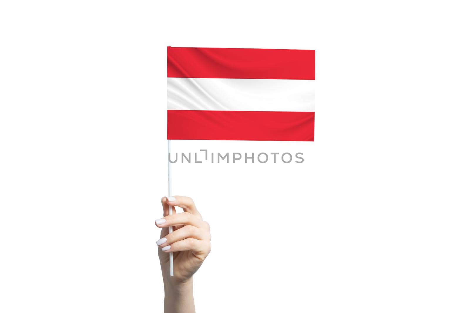 Beautiful female hand holding Austria flag, isolated on white background.