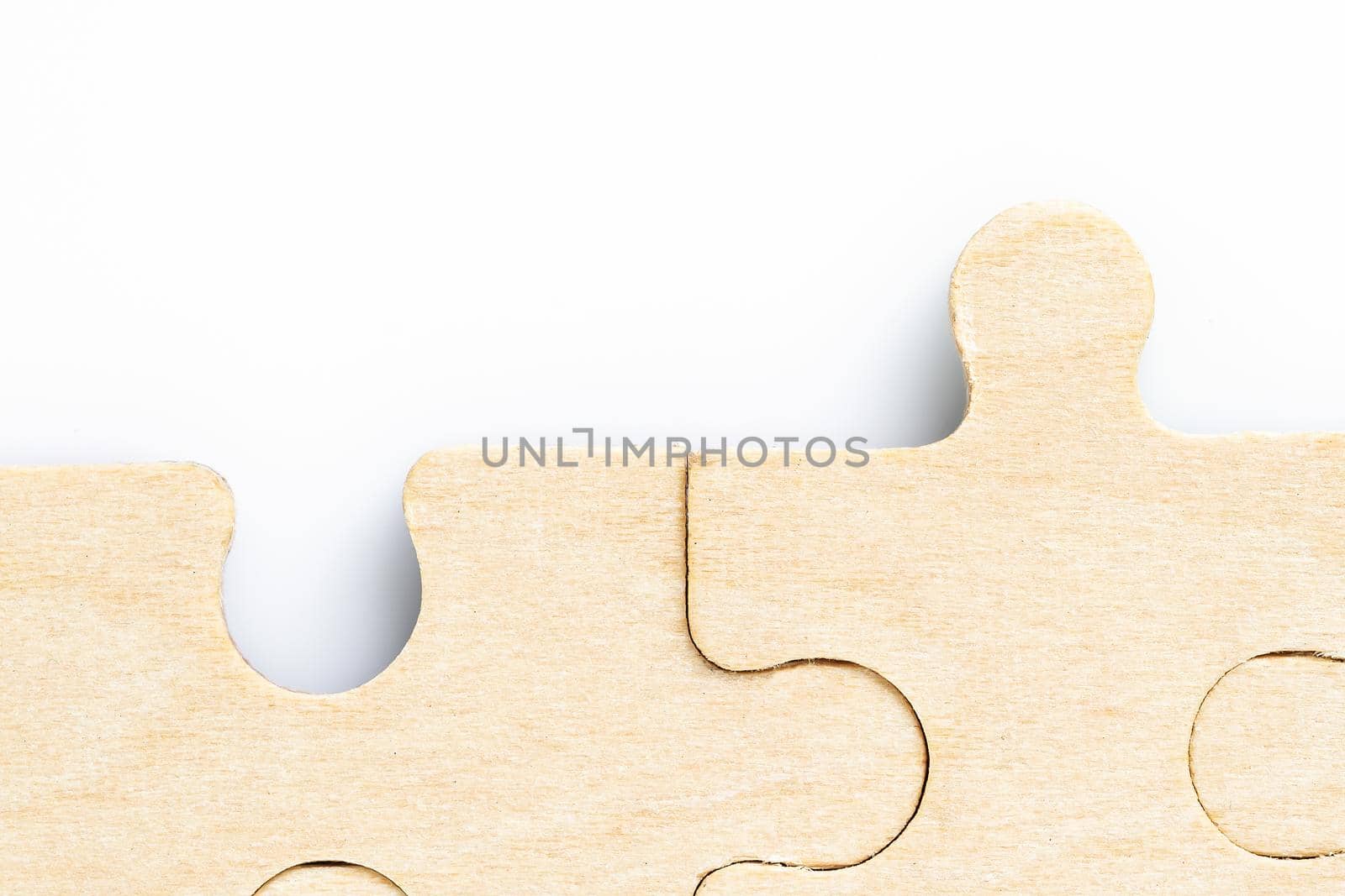 Close up shot of Missing jigsaw puzzle pieces on white background,business concept