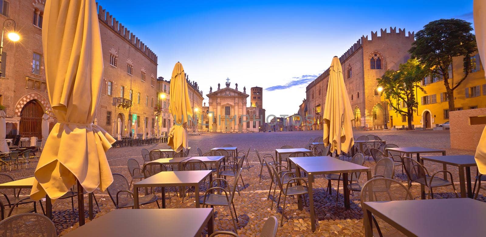 Mantova city Piazza Sordello cafe and architecture dawn view, European capital of culture and UNESCO world heritage site, Lombardy region of Italy
