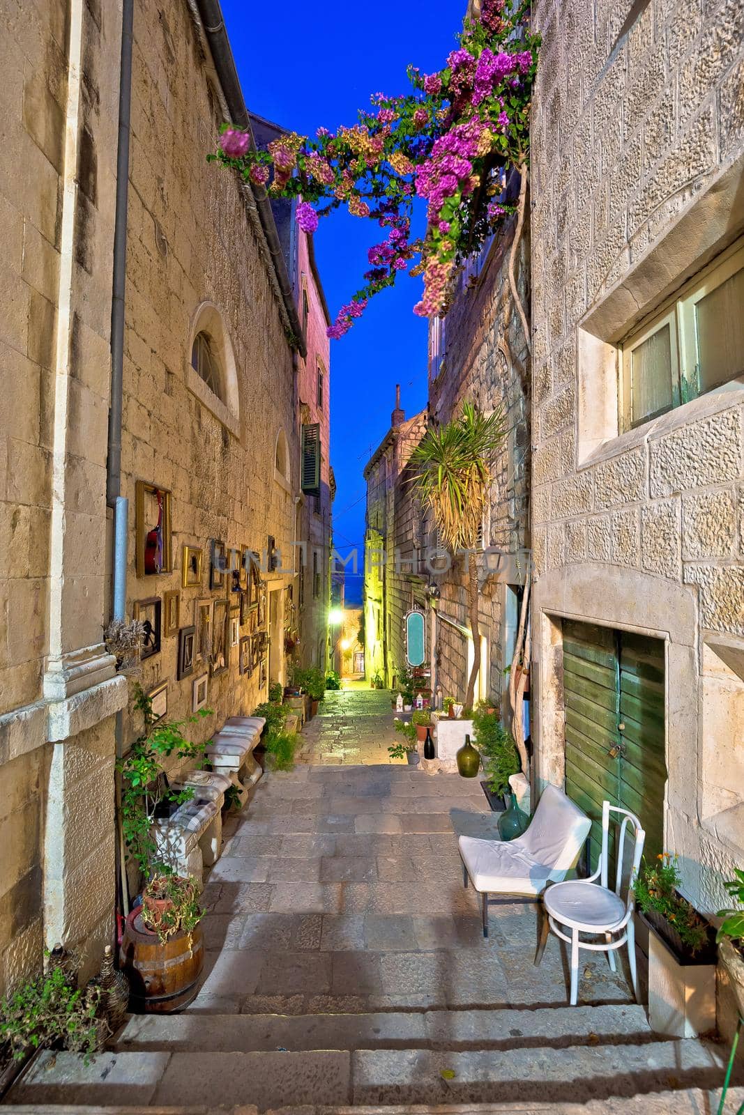 Korcula. Town of Korcula steep narrow stone street colorful evening view, archipelago of southern Dalmatia, Croatia
