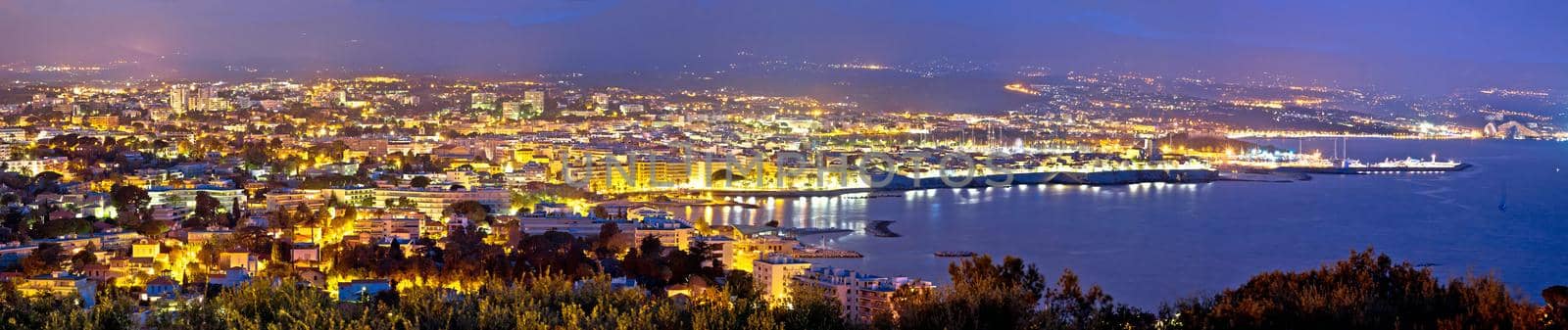 French riviera. Historic town of Antibes coastline panoramic evening view by xbrchx