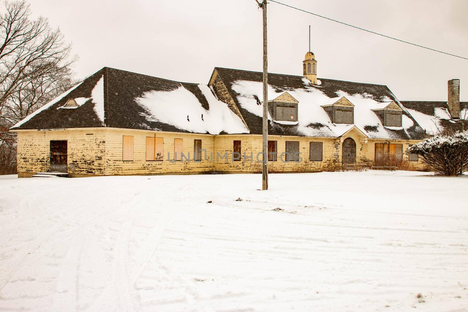 winter abandoned building. Spooky haunted building . High quality photo