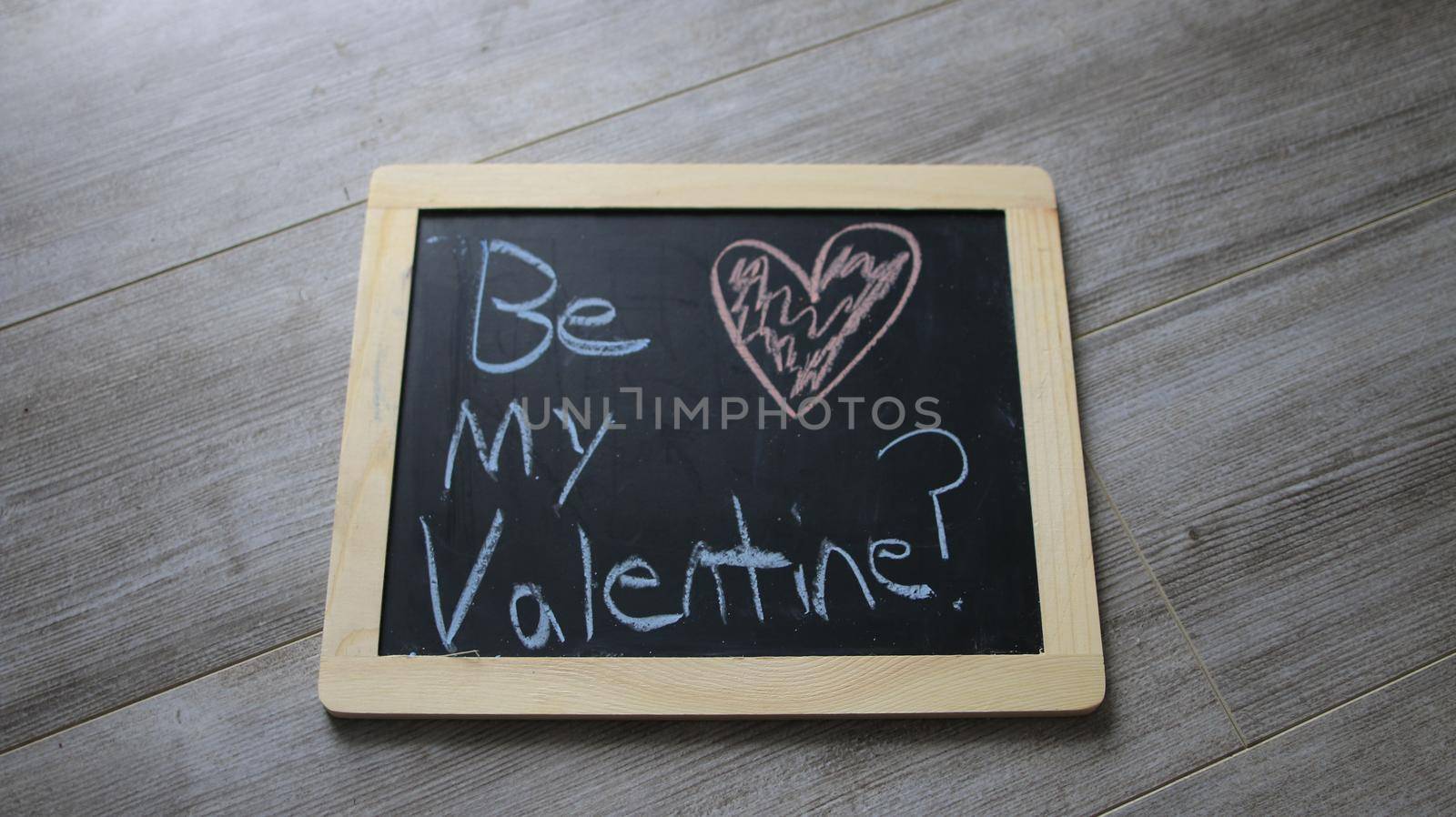 be my valentine wrote on a chalk board by mynewturtle1