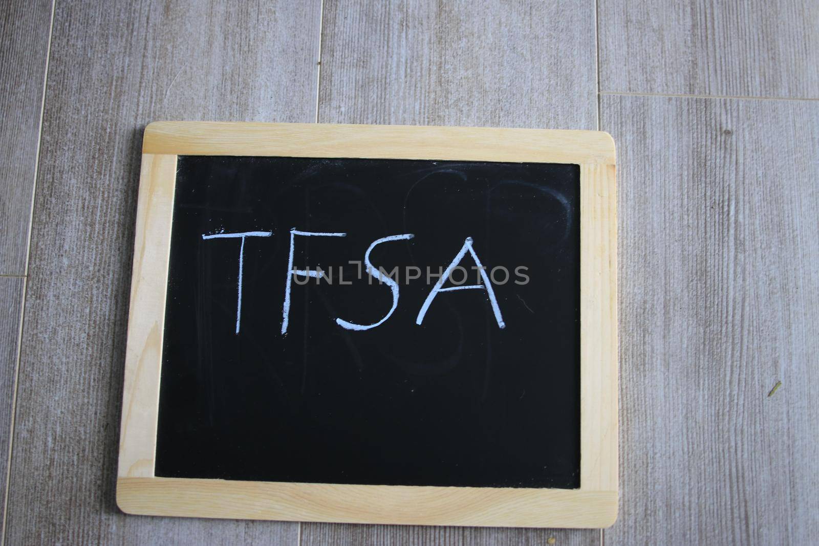 tfsa wrote on a chalk board. TFSA is a canadian savings scheme. High quality photo