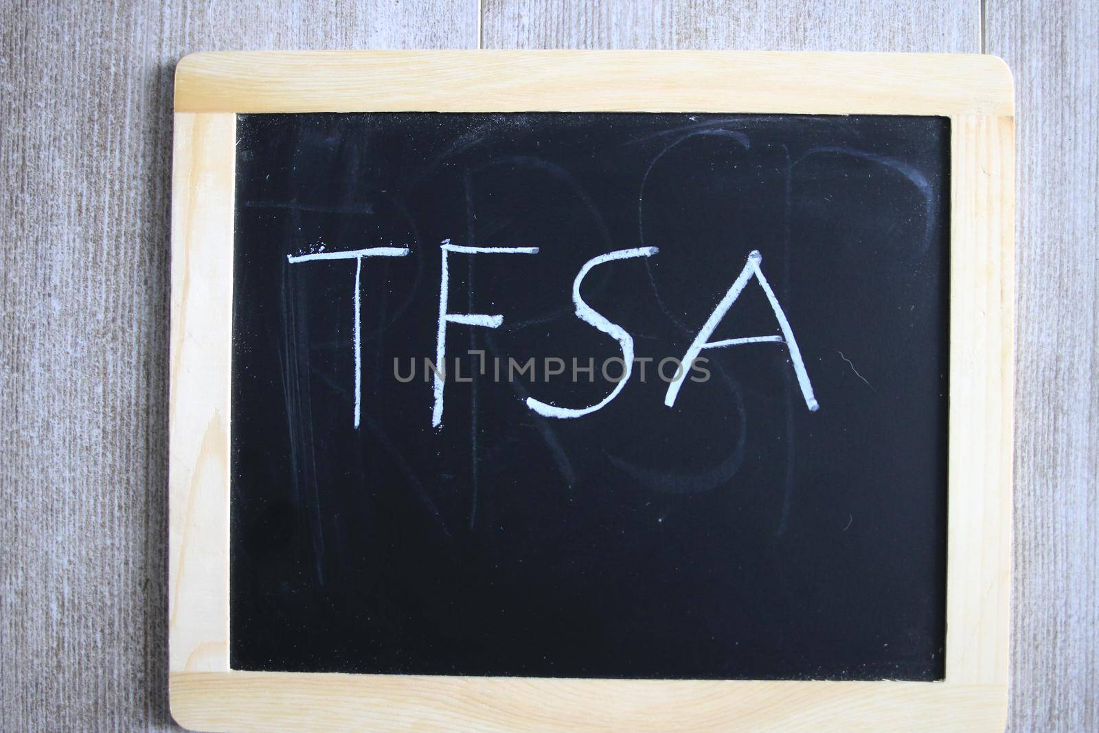 tfsa wrote on a chalk board. TFSA is a canadian savings scheme by mynewturtle1