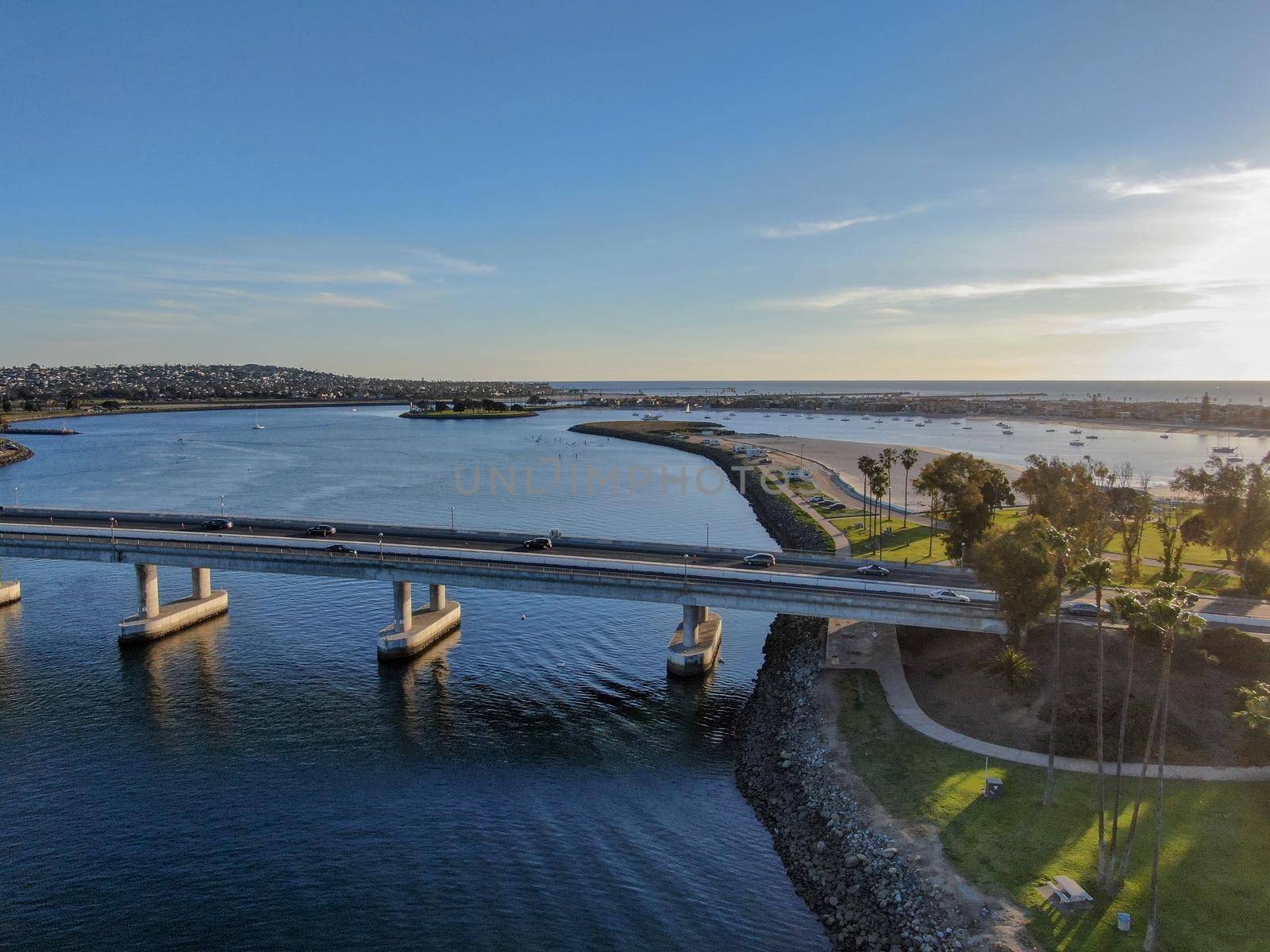  Aerial view of Mission Bay in San Diego, with Ingraham Street bridge during summer sunny day. West Mission Bay drive Bridge famous location in San Diego.