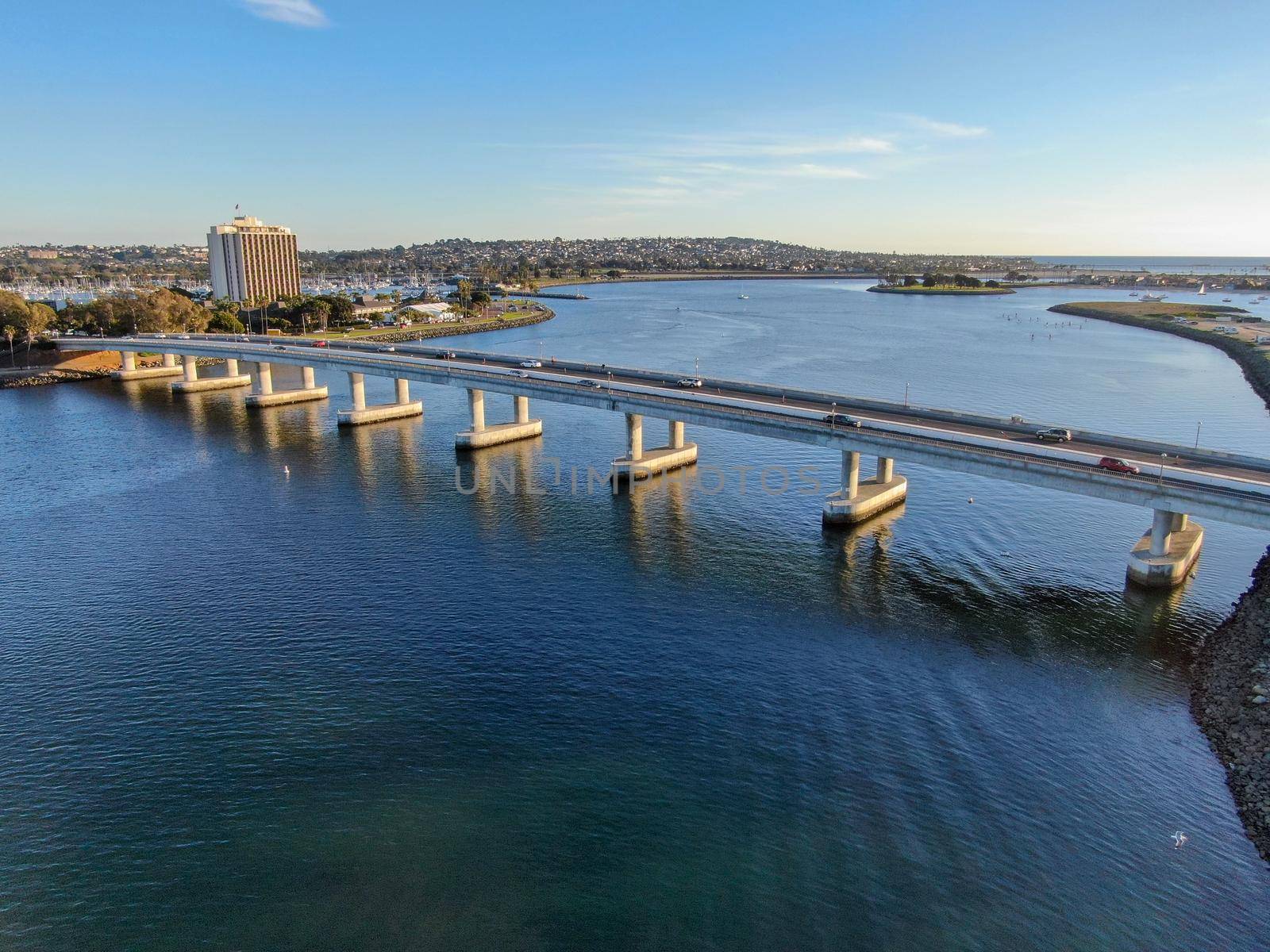  Aerial view of Mission Bay in San Diego, with Ingraham Street bridge during summer sunny day. West Mission Bay drive Bridge famous location in San Diego.