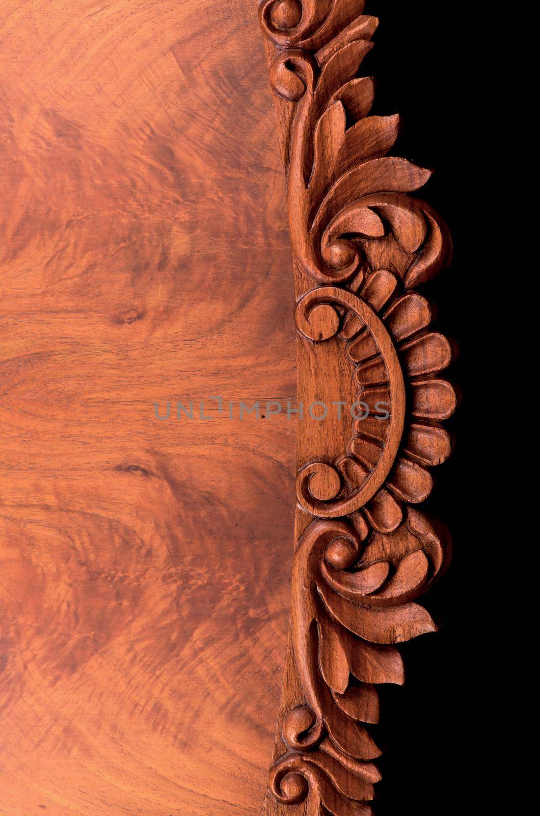 element of carved antique furniture. abstract brown wood background by aprilphoto