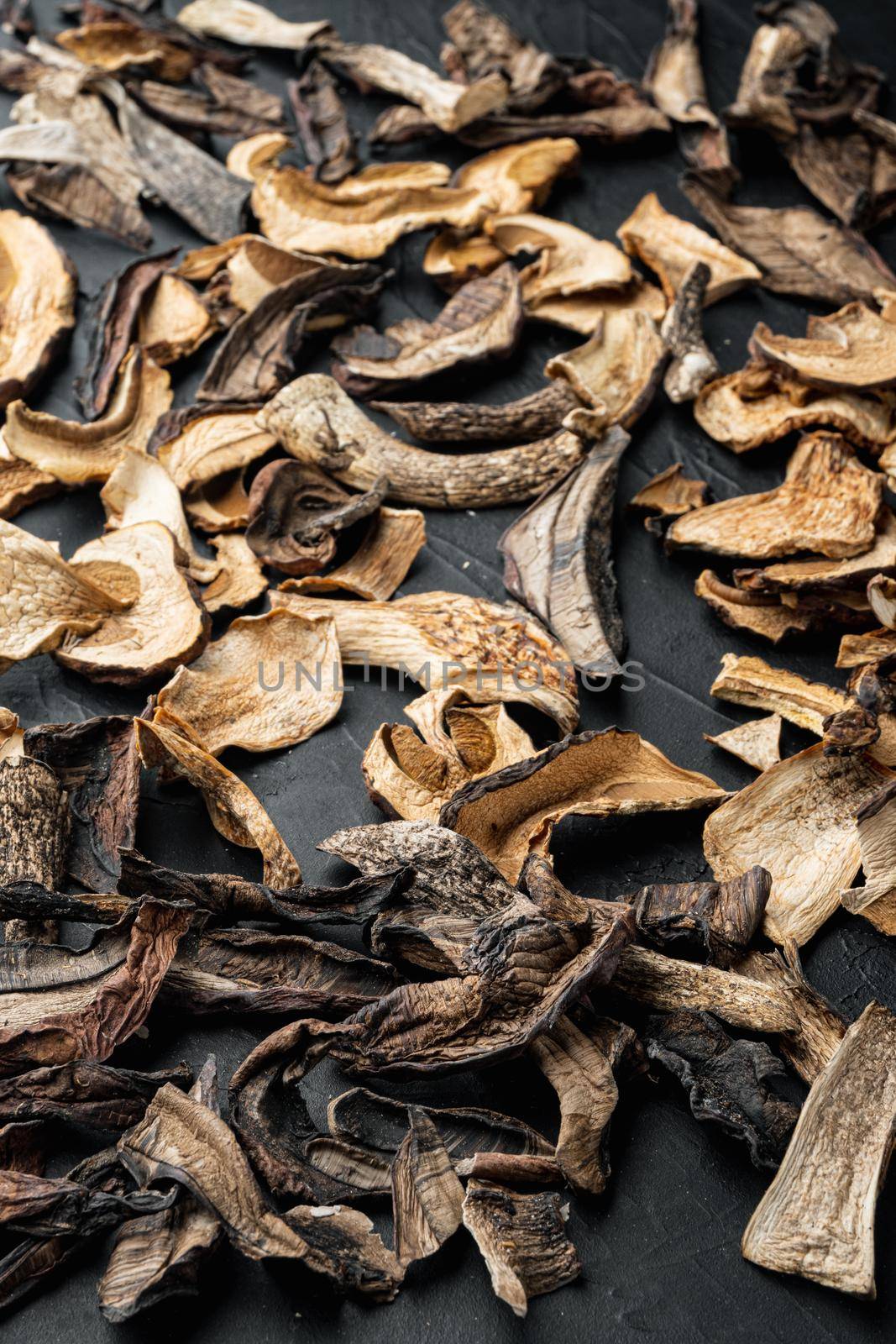 Boletus wild dried mushrooms set, on black background