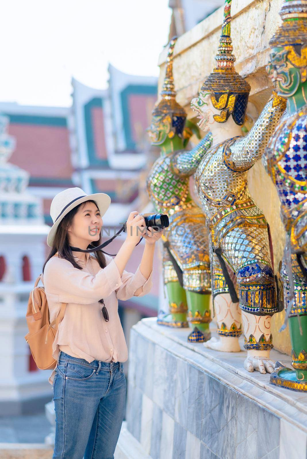 Beautiful asian tourist woman smile and enjoy travel on Vacation in Bangkok at Thailand