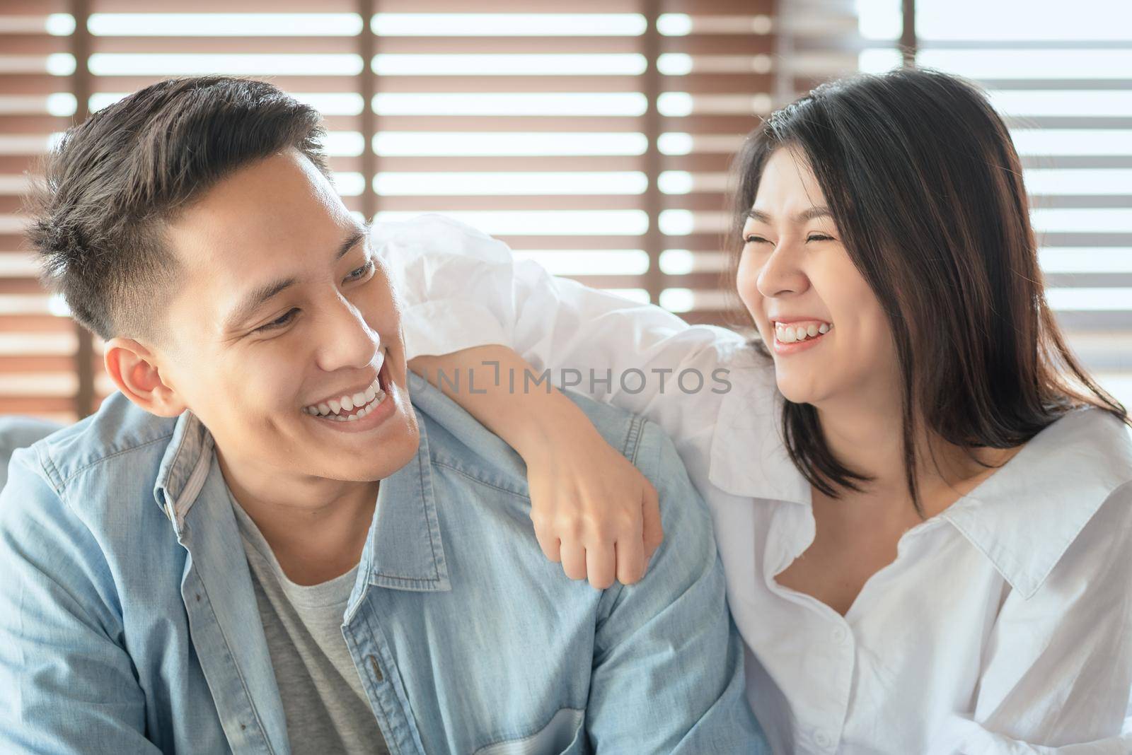 Asian couple lovers enjoy and laugh on vacation make more quality time of happiness together