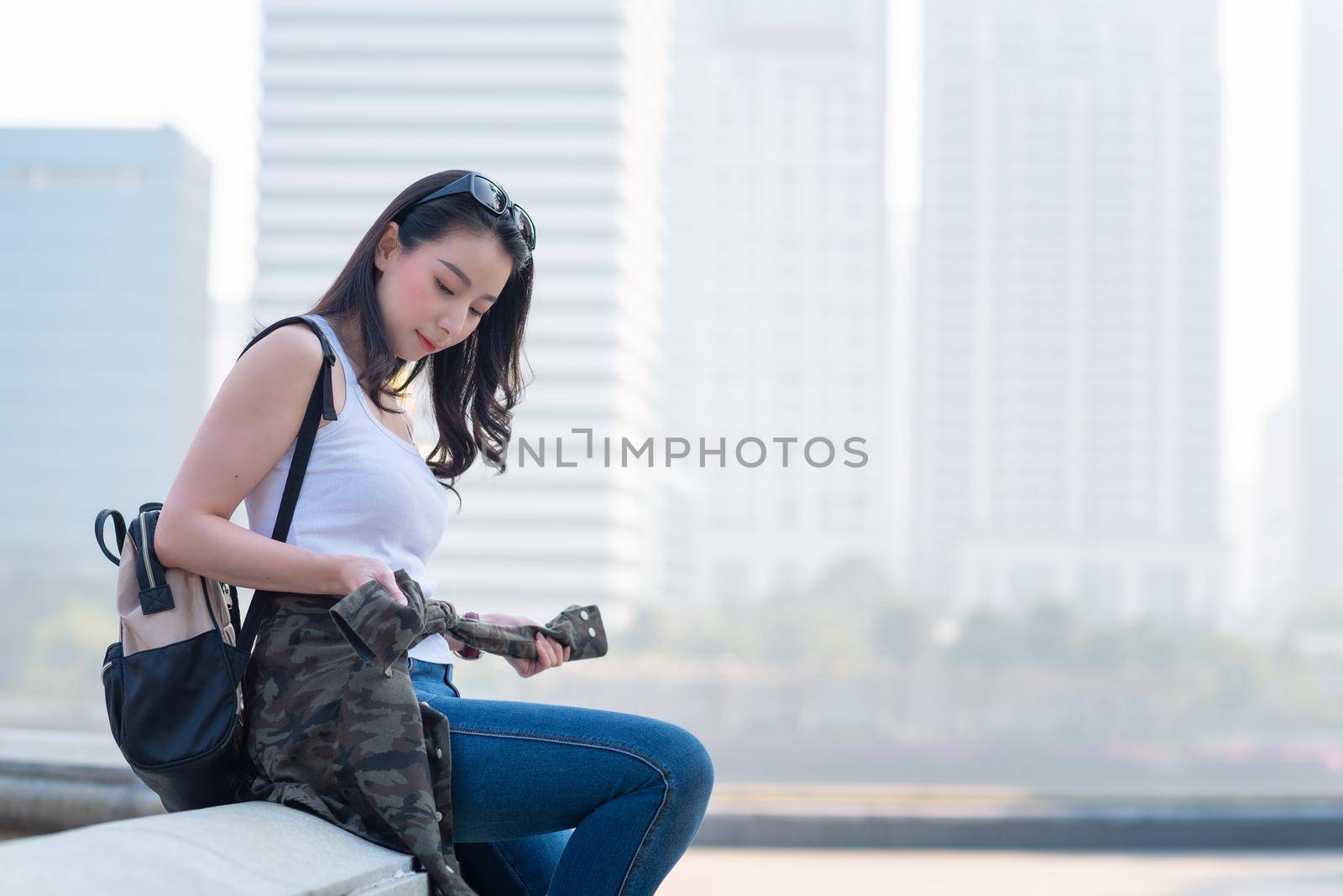 Beautiful asian tourist woman relax and enjoy travel in summer on vacation by Nuamfolio
