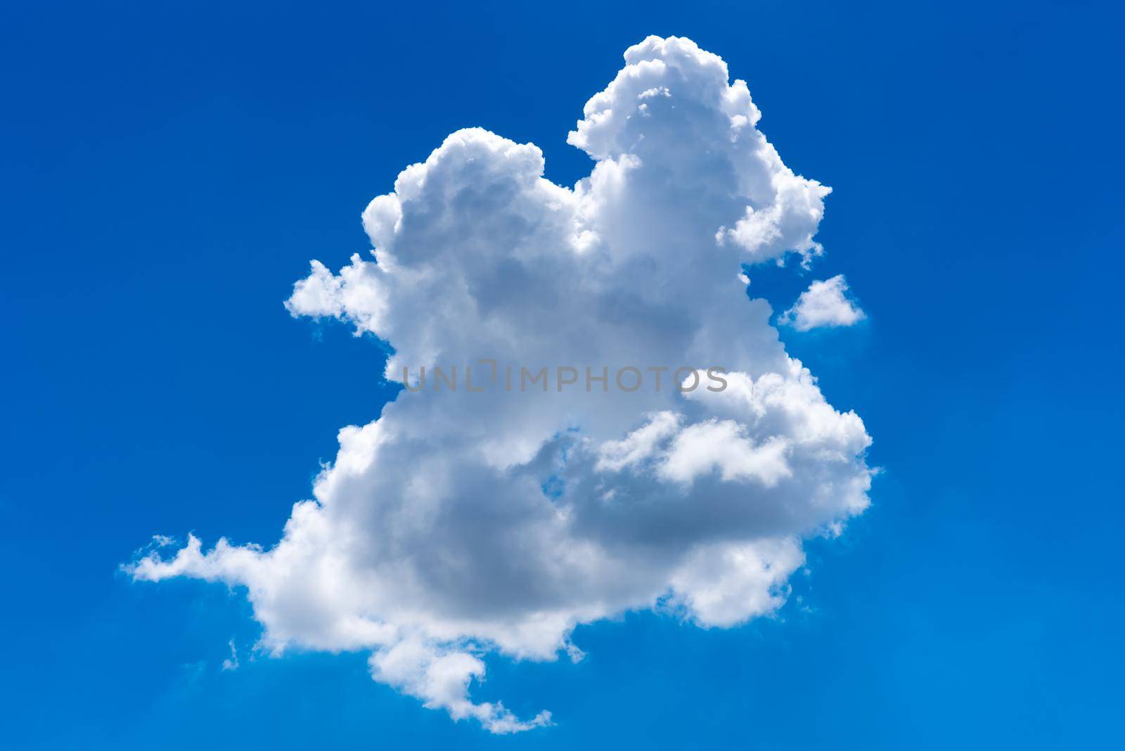 Beautiful cloudscape of nature single white cloud on blue sky background in daytime by Nuamfolio