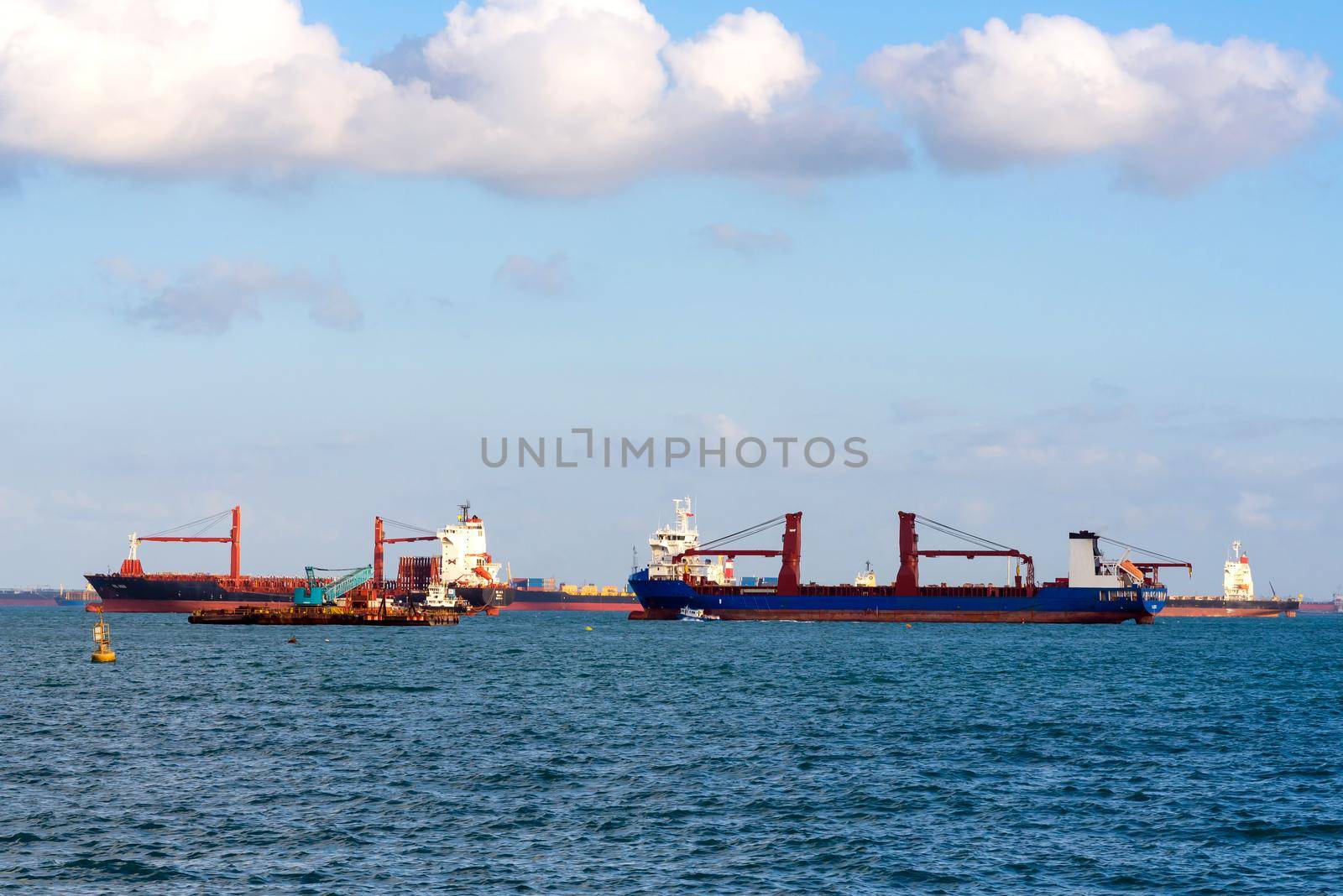 Logistic container ship at shipping yard main transportation of cargo container shipping at Singapore harbour 