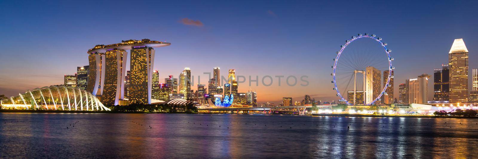 Panorama view of business downtown building area during twilight time at Singapore.