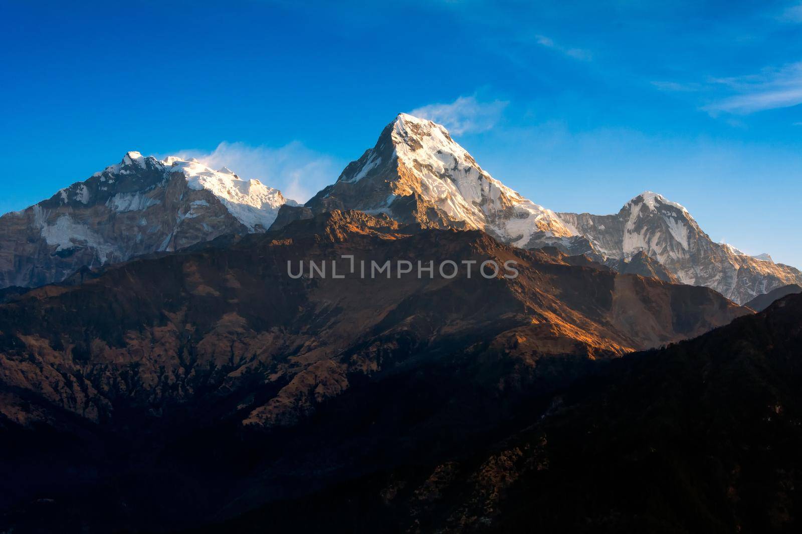 Nature view of Himalayan mountain range at Poon hill view point,Nepal. Poon hill is the famous view point in Gorepani village to see beautiful sunrise over Annapurna mountain range in Nepal by Nuamfolio