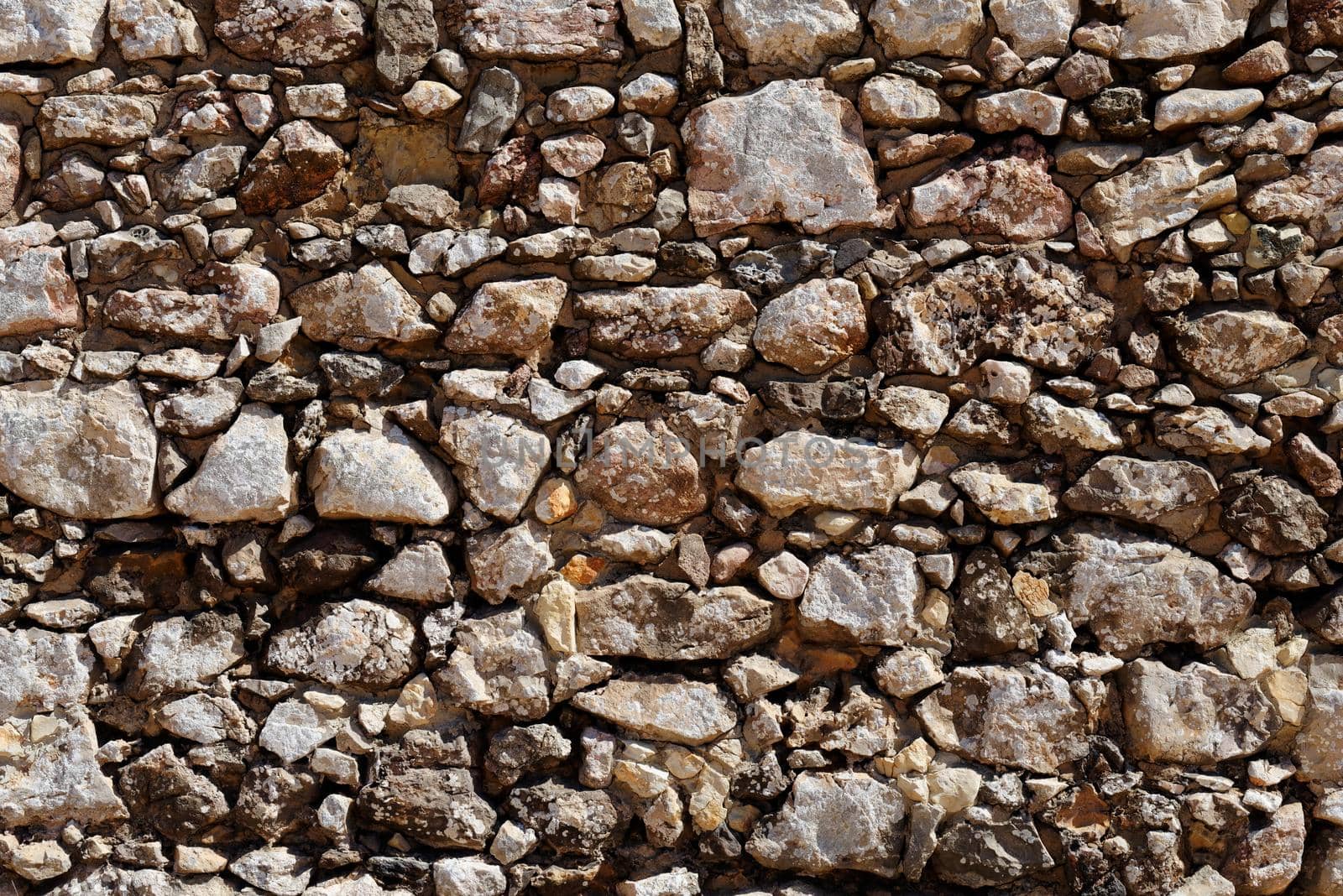 Ancient rough stone wall texture by slavapolo