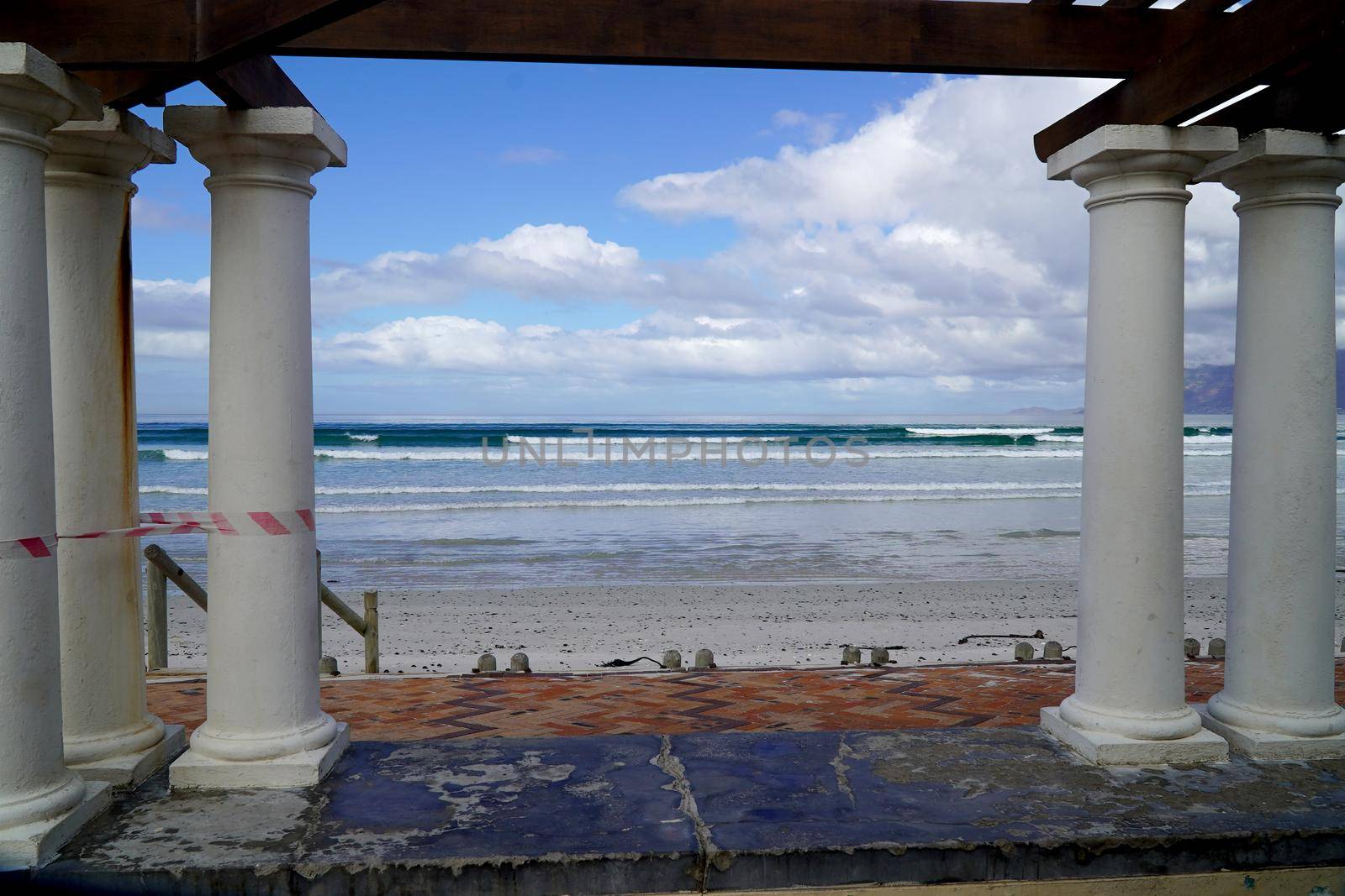 Cape Town, South Africa - 16 April 2020 : Empty beach at Muizenberg in Cape town, South Africa during the lock down.