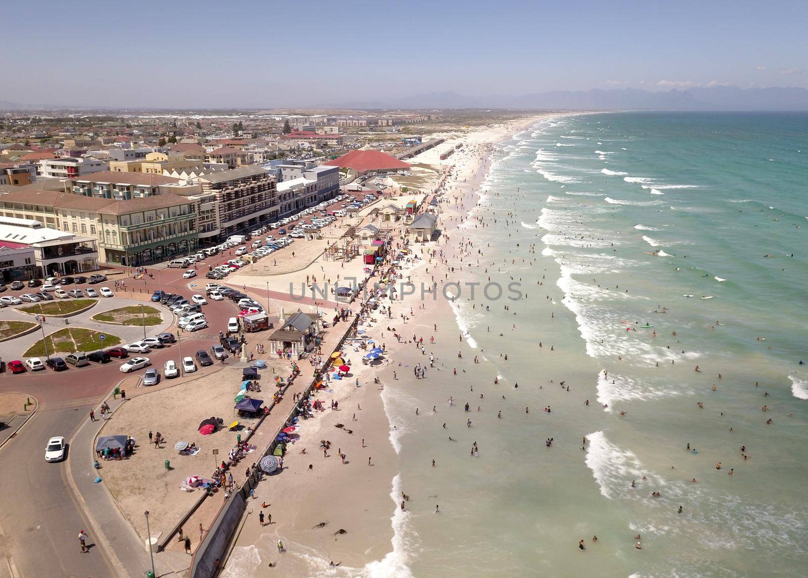 Aerial overhead Muizenberg beach in Cape Town South Africa by fivepointsix