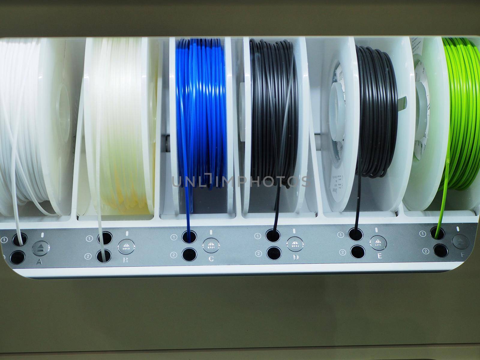 Spools of multicolor thermoplastic filament installed on 3d printer
Turin Italy February 12 2020