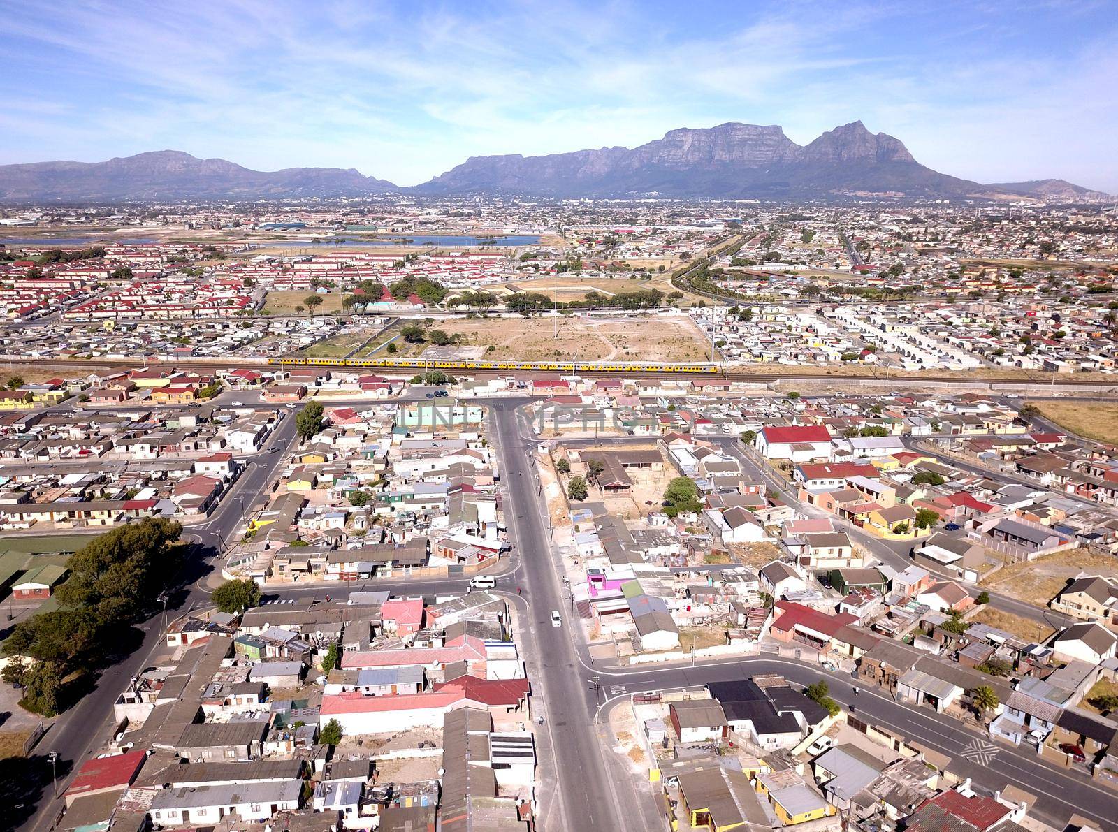 Aerial over Gugulethu township, Cape Town, South Africa by fivepointsix