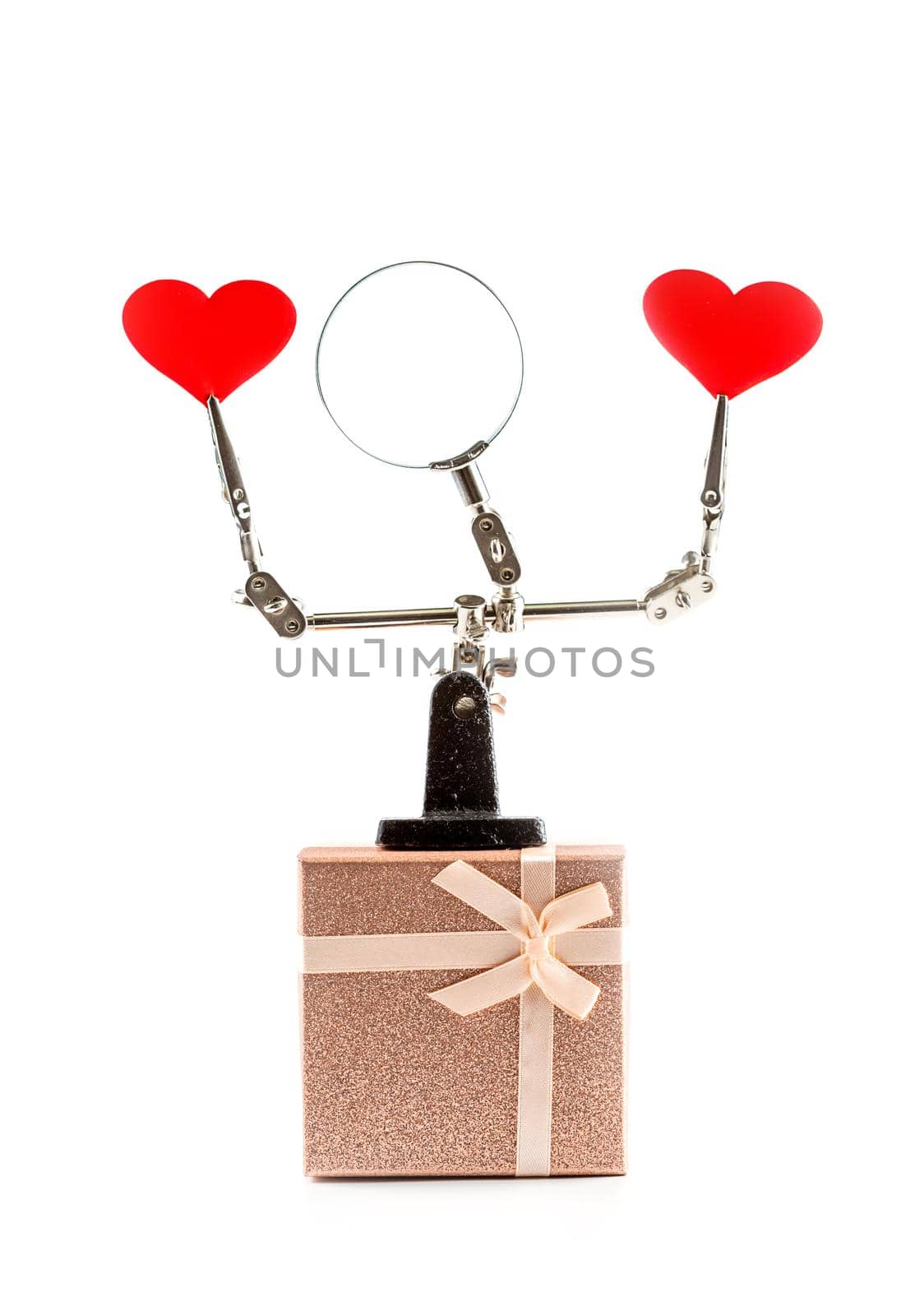 Valentines Day background with tool third hand holding hearts and gift by galinasharapova
