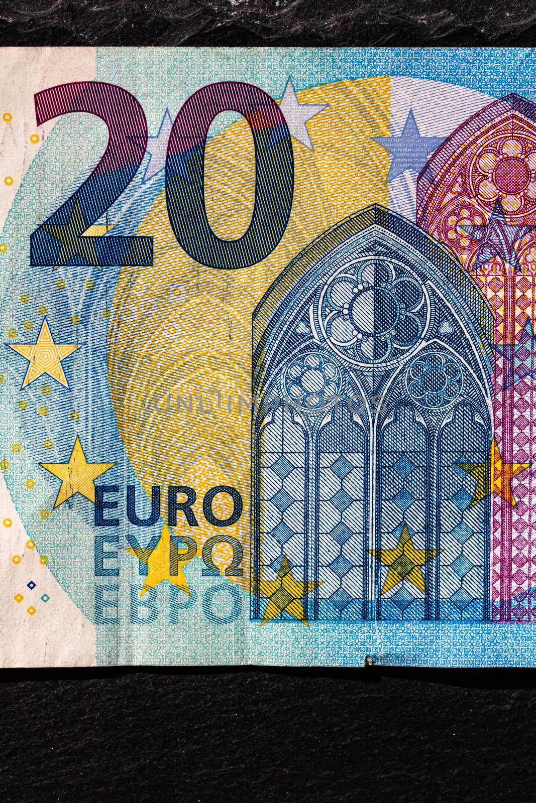 Selective focus on detail of euro banknotes. Close up macro detail of money banknotes, 20 euro isolated. World money concept, inflation and economy concept