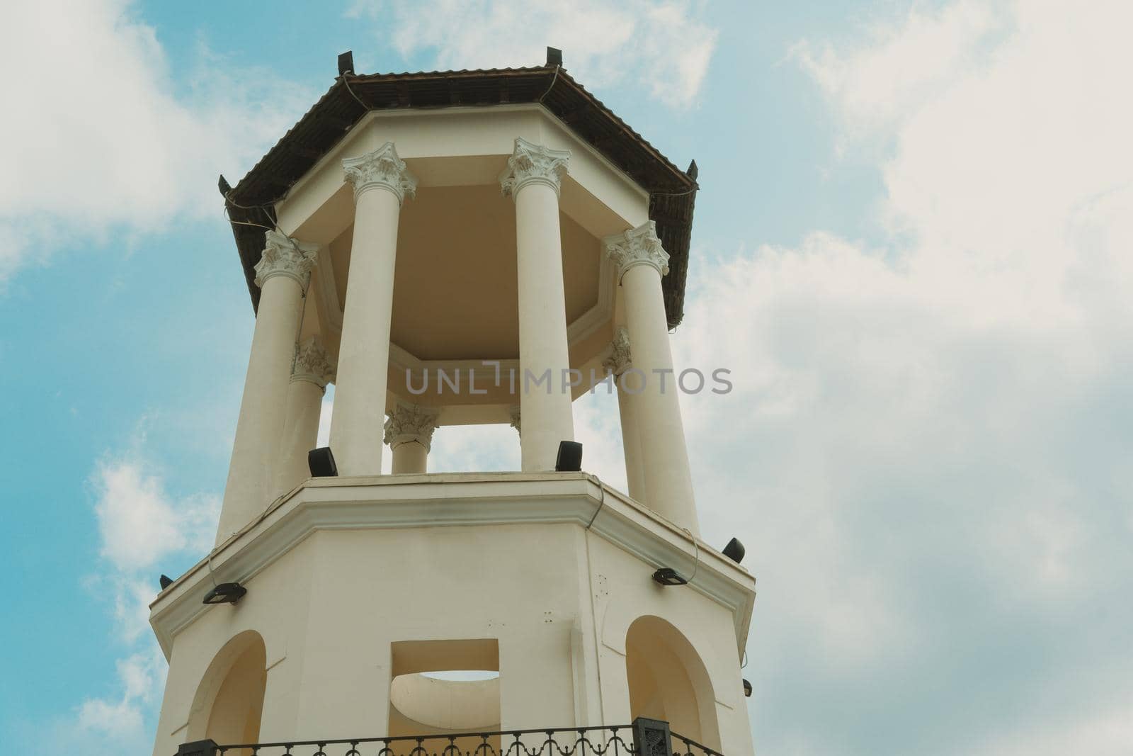 White rotunda against a blue cloudy sky. Sochi, Russia