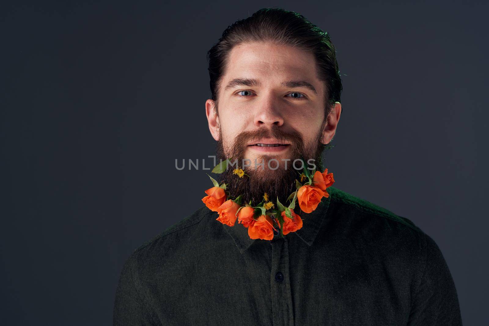 Portrait of a bearded man flowers decoration gift romance. High quality photo