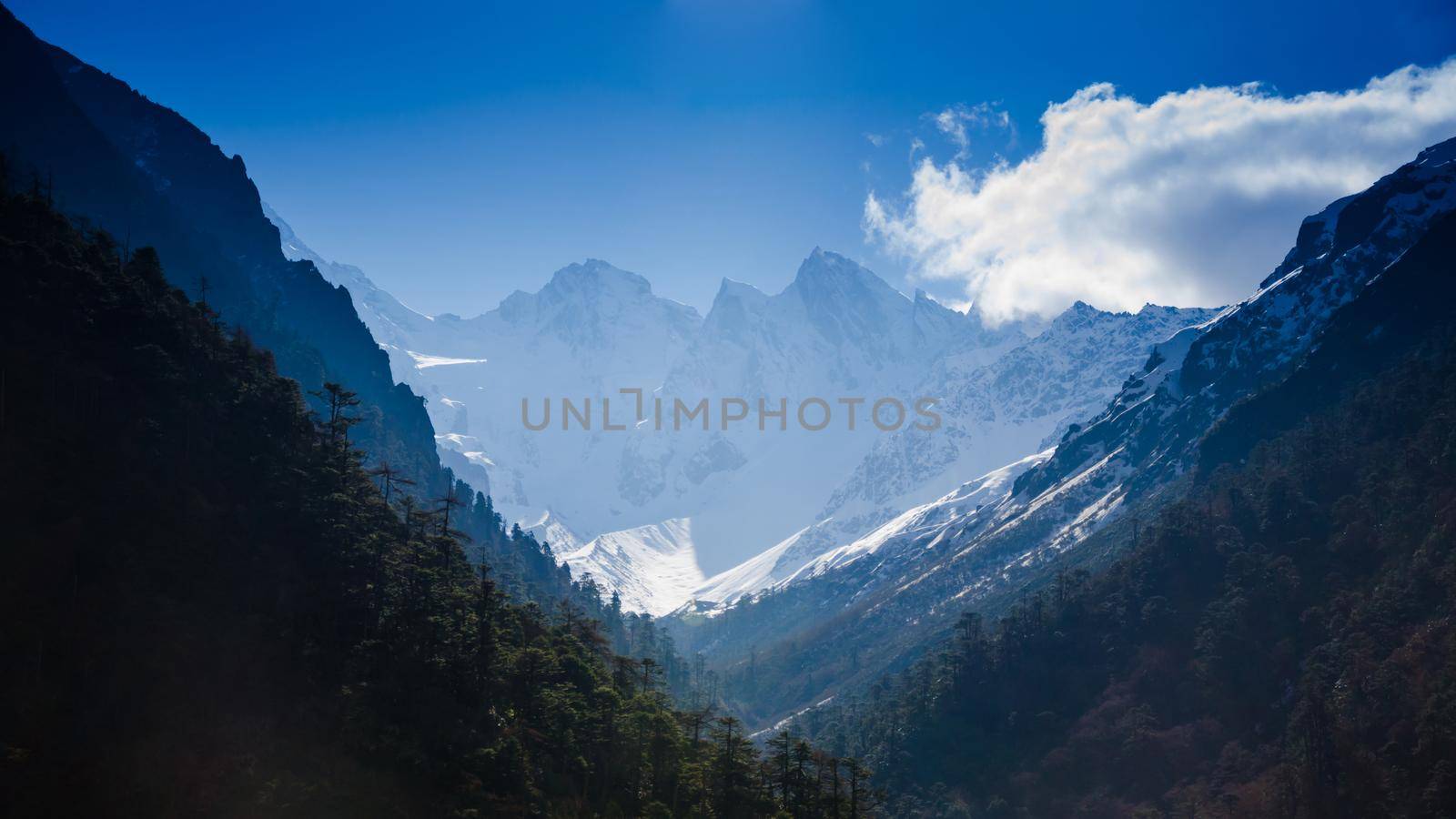 Snow mountain with blue sky at Sikkim , India by Nuamfolio