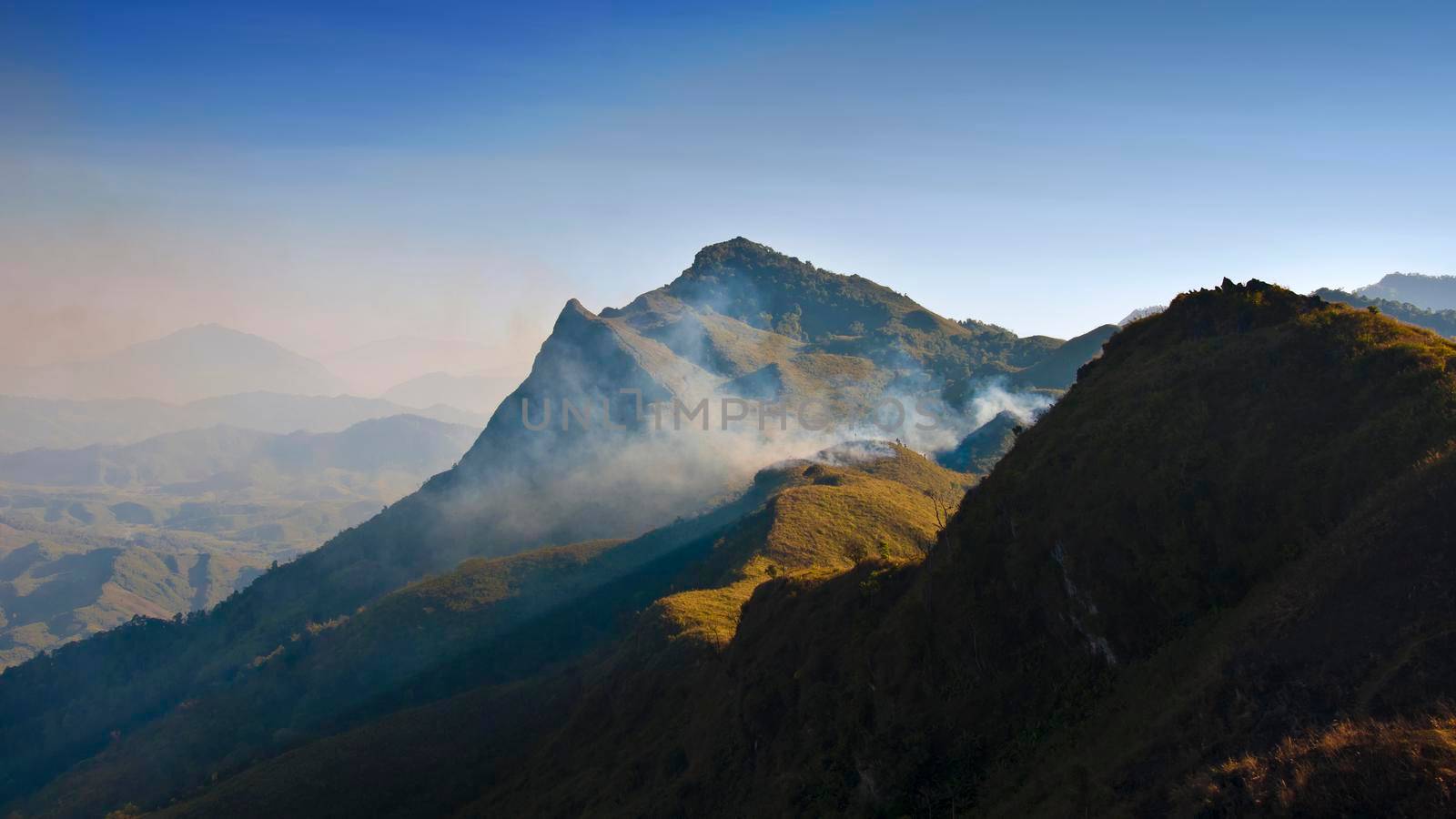 Beautiful evening view and sunset time of mountain and cloudscape at Thailand