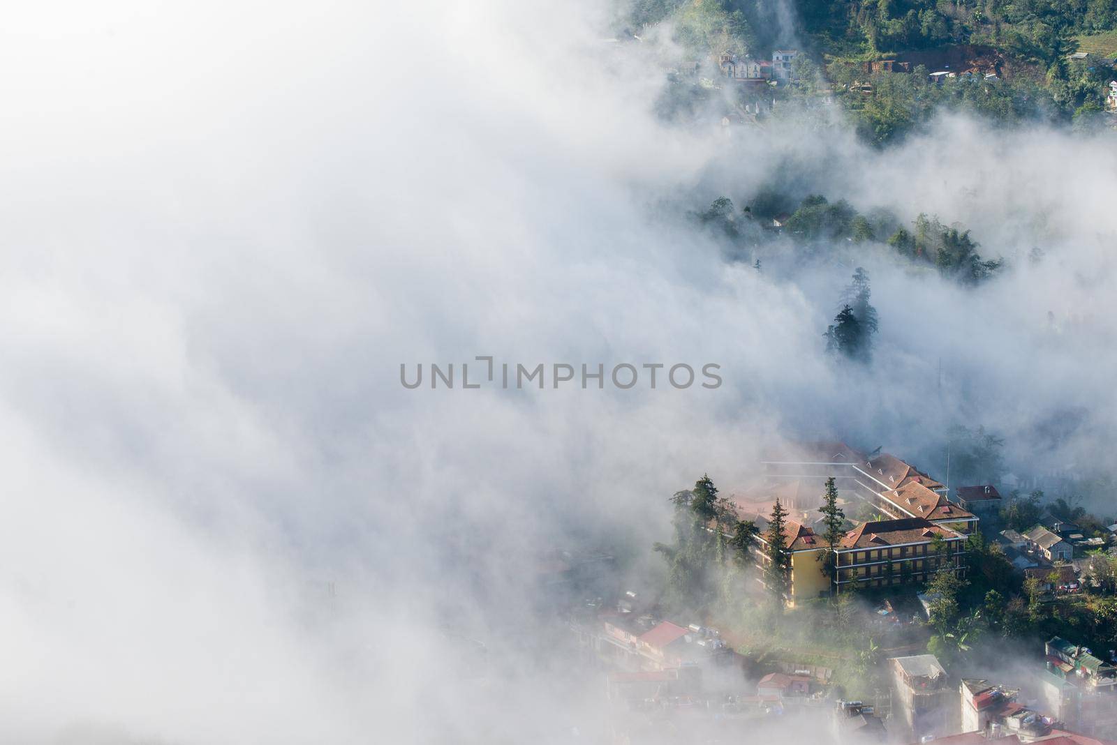 Sapa valley city in the mist in the morning, Vietnam
