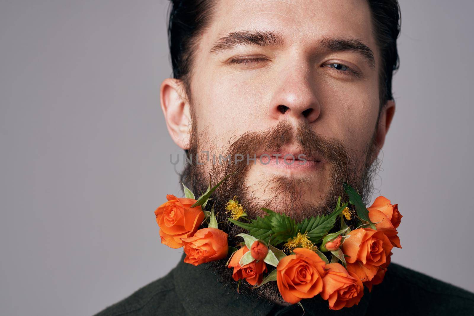 Elegant man black shirt flowers in a beard decoration romance attractive look by SHOTPRIME