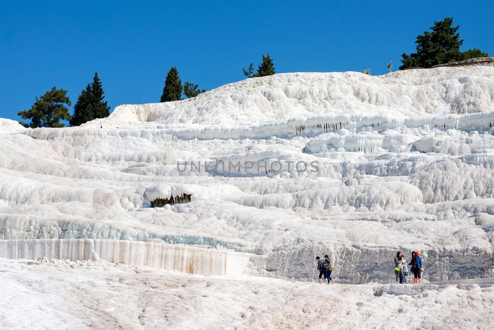 Natural travertine pools and terraces at Pamukkale ,Turkey. Pamukkale, meaning cotton castle in Turkish.