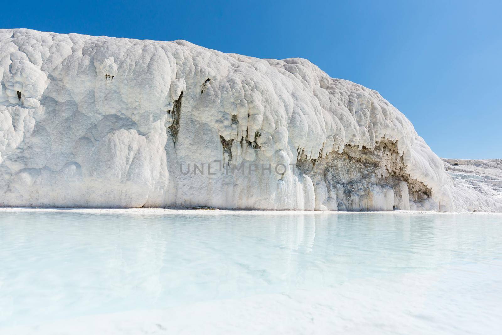 Natural travertine pools and terraces at Pamukkale ,Turkey. Pamukkale, meaning cotton castle in Turkish,Turkey