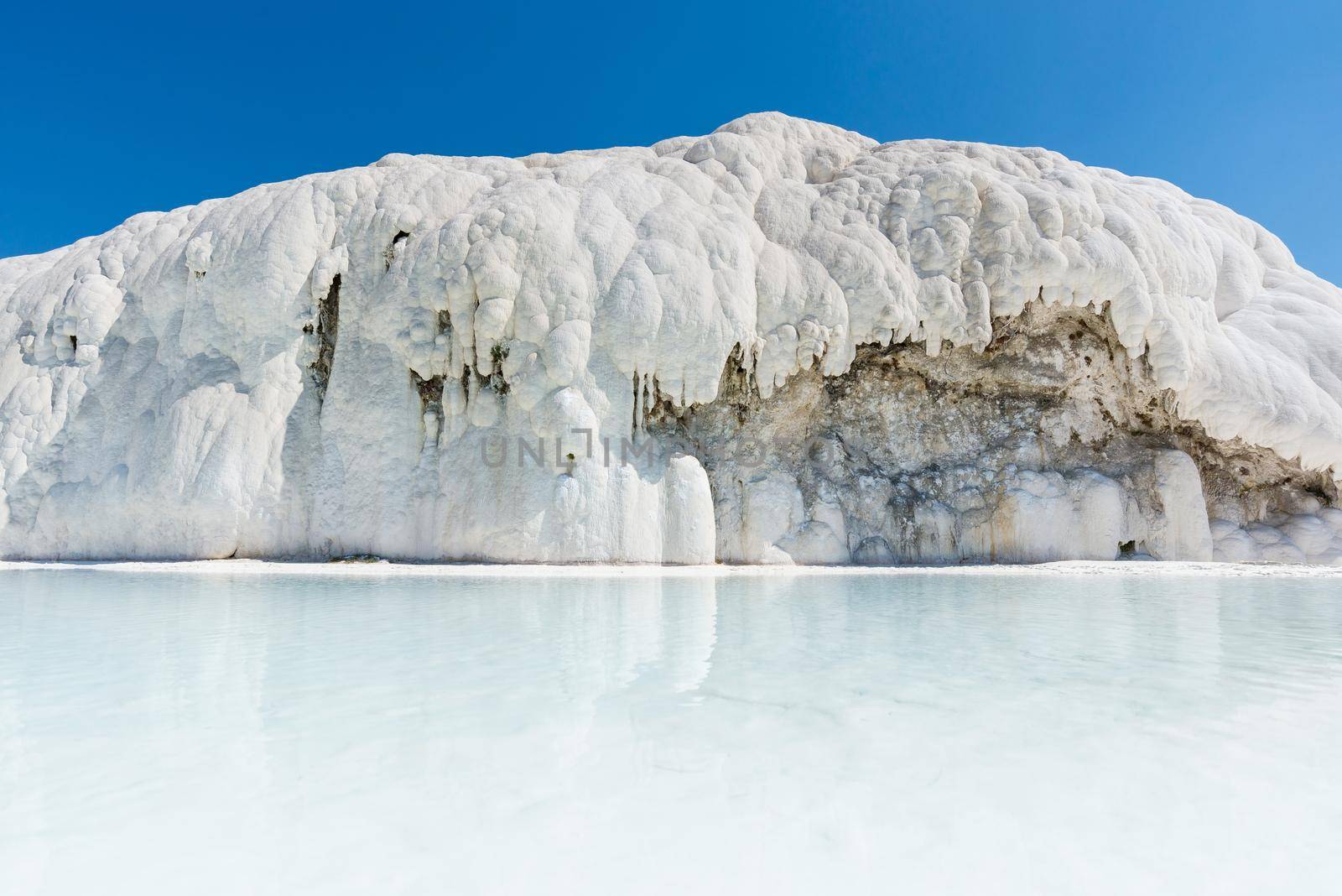 Natural travertine pools and terraces at Pamukkale ,Turkey. Pamukkale, meaning cotton castle in Turkish,Turkey by Nuamfolio
