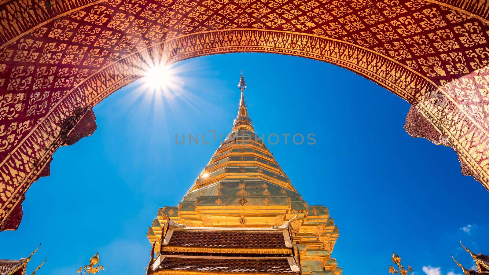 Wat Phra That Doi Suthep with blue sky in Chiang Mai. The attractive sightseeing place for tourists and landmark of Chiang Mai,Thailand by Nuamfolio