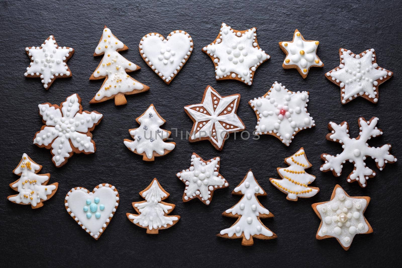 Homemade christmas cookies on slate table