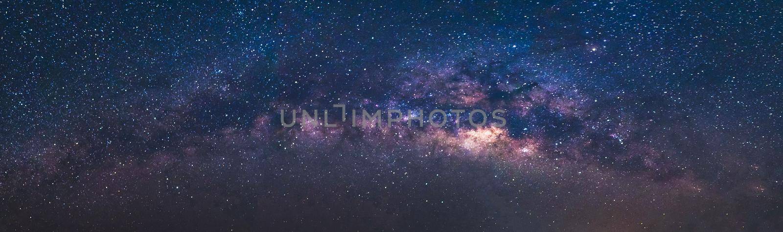 Panorama view universe space shot of milky way galaxy with stars on a night sky background.The Milky Way is the galaxy that contains our Solar System. by Nuamfolio
