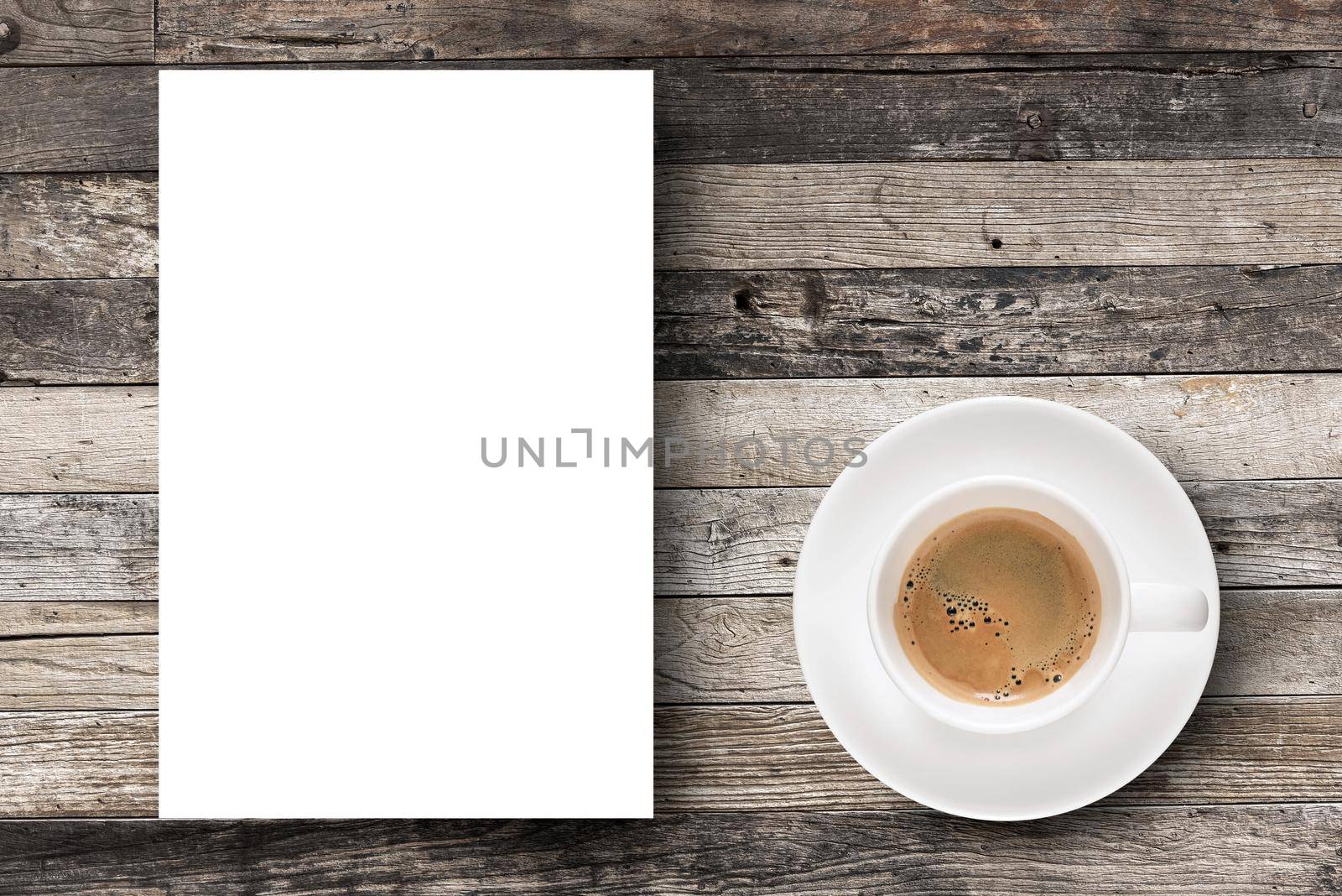 Flat lay Espresso coffee in coffee cup and white blank paper with copy-space on wooden table background. by Nuamfolio