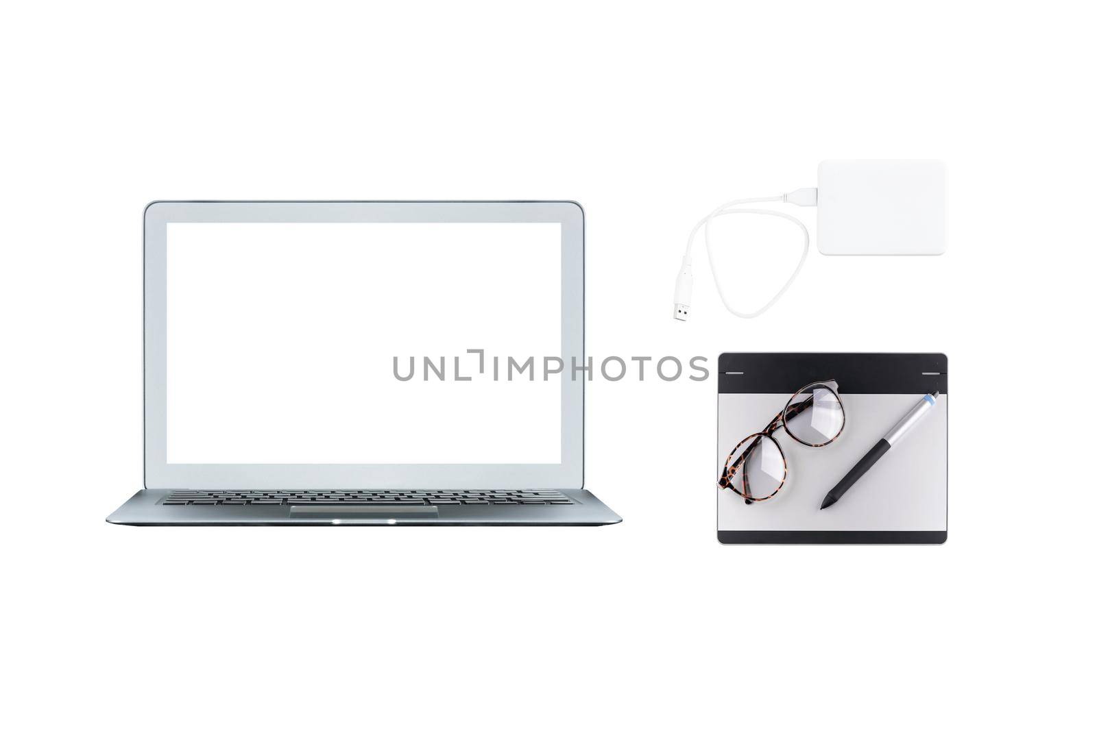 Computer laptop, graphic tablet and external harddisk isolated on white background. Object for technology and gadget for modern lifestyle and freelance work concept.